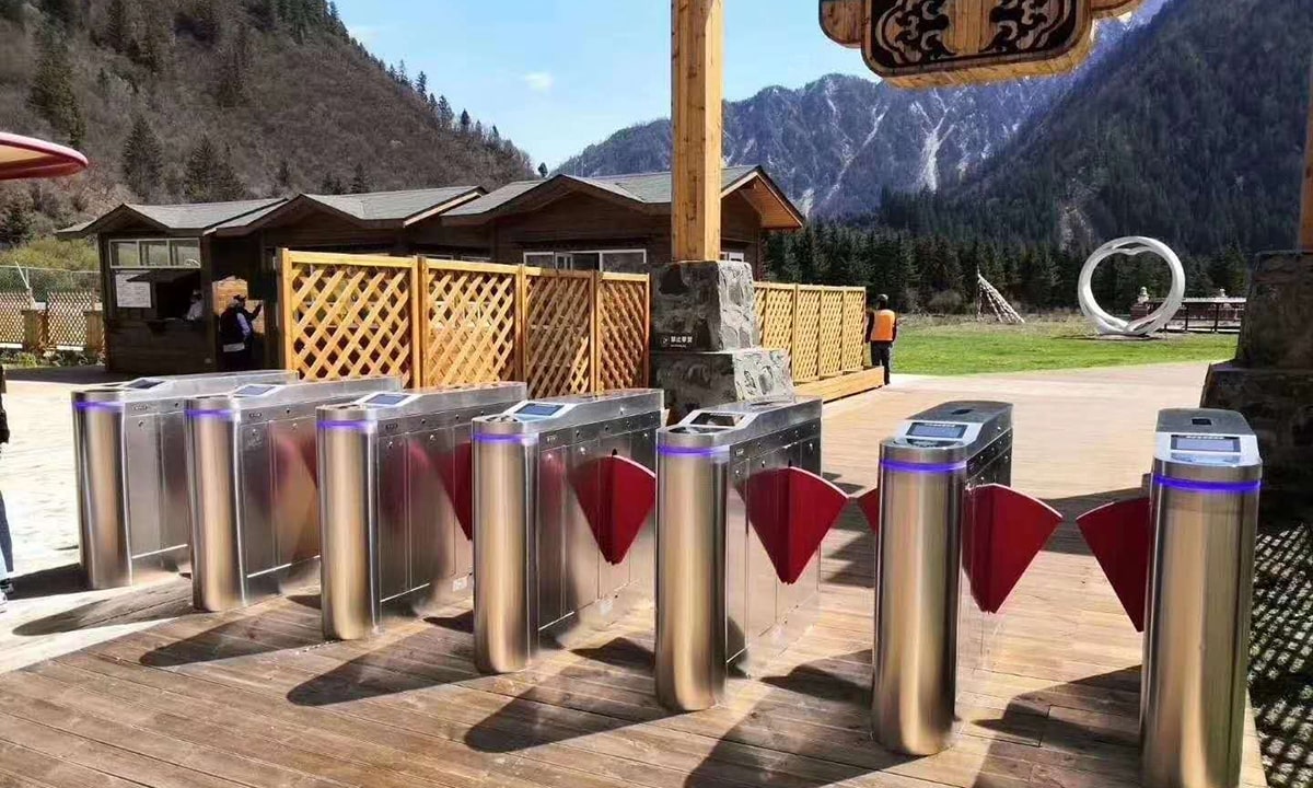 What should be taken into consideration before buying turnstiles for tourist attractions?